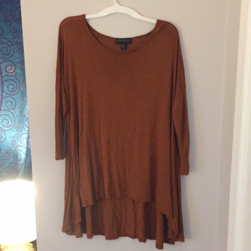 Tunic style shirt, shorter in front, 3/4 sleeves